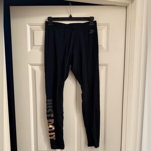Nike Black Leggings with Metallic Logo